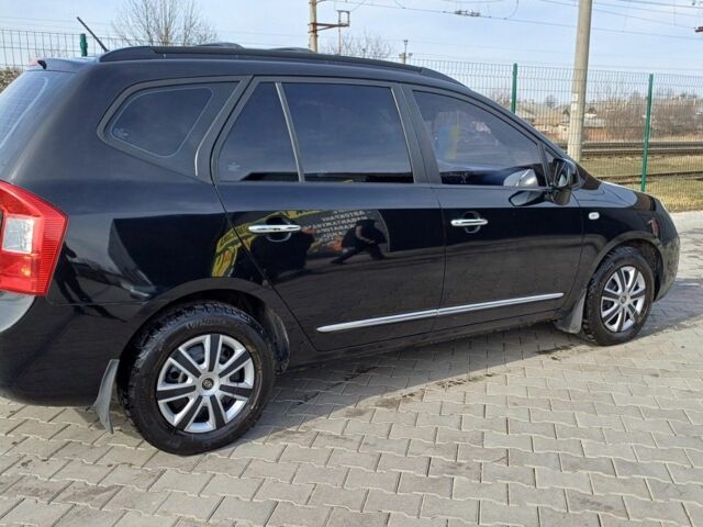 Черный Киа Каренс, объемом двигателя 2 л и пробегом 229 тыс. км за 5200 $, фото 1 на Automoto.ua