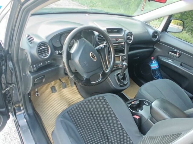 Чорний Кіа Каренс, об'ємом двигуна 2 л та пробігом 265 тис. км за 5800 $, фото 7 на Automoto.ua