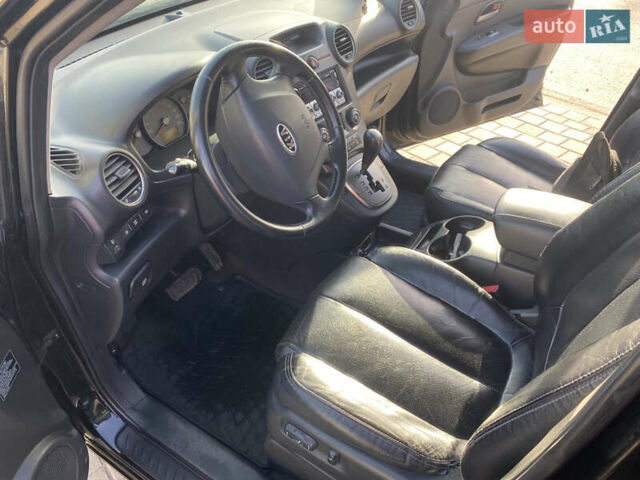 Чорний Кіа Каренс, об'ємом двигуна 2 л та пробігом 229 тис. км за 6900 $, фото 13 на Automoto.ua