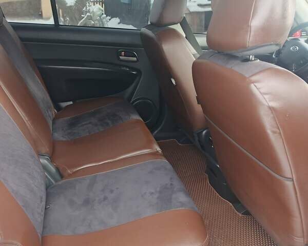 Чорний Кіа Каренс, об'ємом двигуна 1.99 л та пробігом 208 тис. км за 6300 $, фото 5 на Automoto.ua