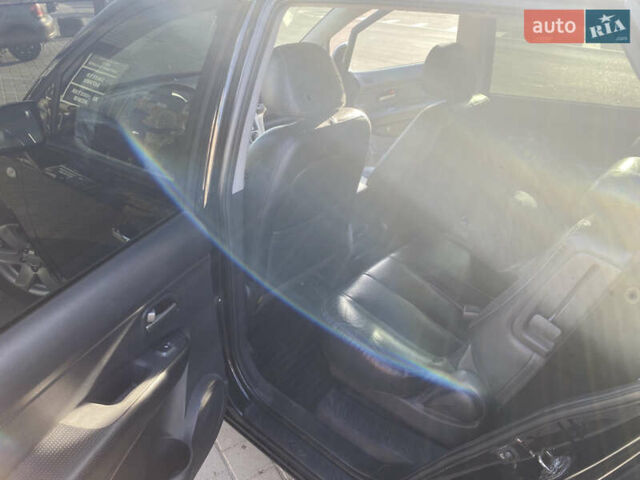 Чорний Кіа Каренс, об'ємом двигуна 2 л та пробігом 229 тис. км за 6900 $, фото 12 на Automoto.ua