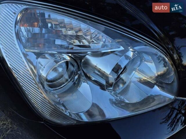 Чорний Кіа Каренс, об'ємом двигуна 2 л та пробігом 88 тис. км за 6450 $, фото 4 на Automoto.ua