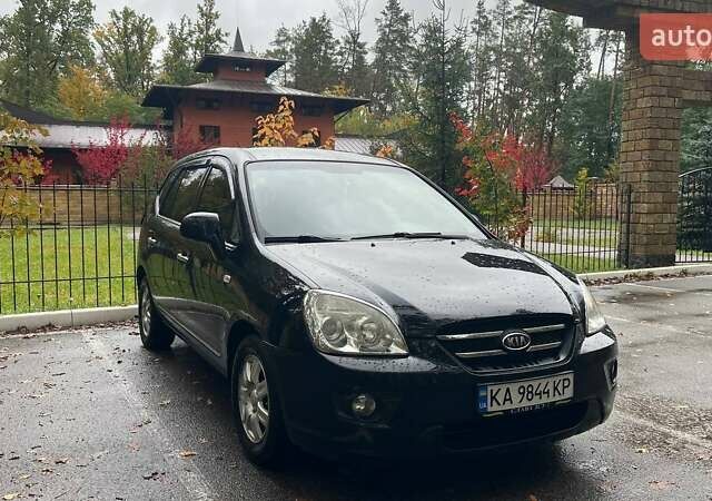 Чорний Кіа Каренс, об'ємом двигуна 2 л та пробігом 207 тис. км за 6500 $, фото 1 на Automoto.ua