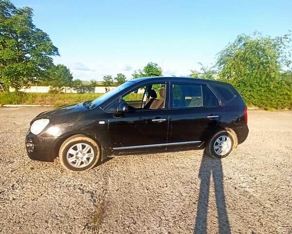 Чорний Кіа Каренс, об'ємом двигуна 2 л та пробігом 234 тис. км за 5500 $, фото 14 на Automoto.ua