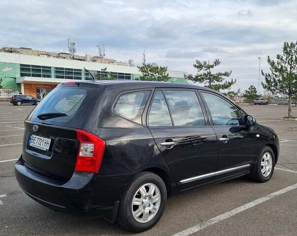 Черный Киа Каренс, объемом двигателя 2 л и пробегом 347 тыс. км за 5500 $, фото 3 на Automoto.ua