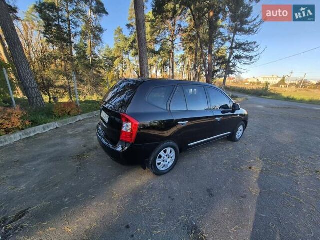 Чорний Кіа Каренс, об'ємом двигуна 2 л та пробігом 88 тис. км за 6450 $, фото 22 на Automoto.ua