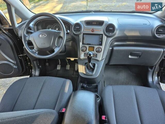 Чорний Кіа Каренс, об'ємом двигуна 2 л та пробігом 88 тис. км за 6450 $, фото 43 на Automoto.ua