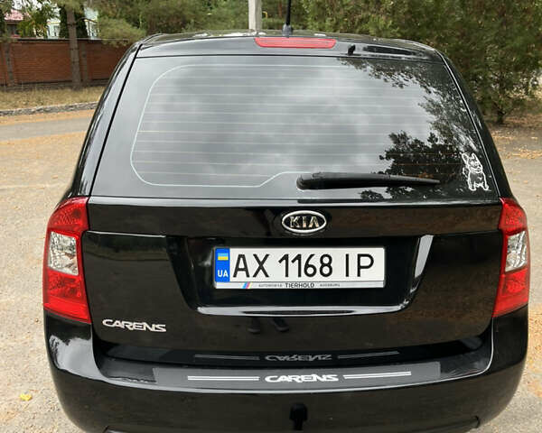 Кіа Каренс 2008 у Харкові на Automoto.ua Чорний Кіа Каренс, об'ємом двигуна 2 л та пробігом 207 тис. км за 7000 $, фото 5 на Automoto.ua