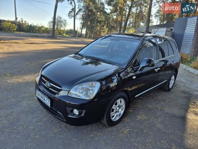 Чорний Кіа Каренс, об'ємом двигуна 2 л та пробігом 88 тис. км за 6450 $, фото 9 на Automoto.ua