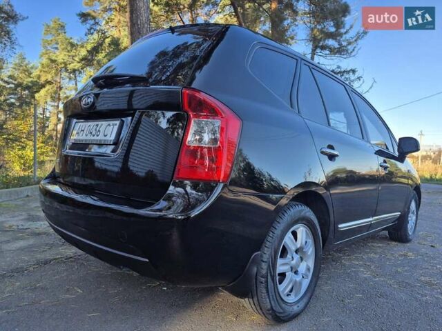 Чорний Кіа Каренс, об'ємом двигуна 2 л та пробігом 88 тис. км за 6450 $, фото 18 на Automoto.ua