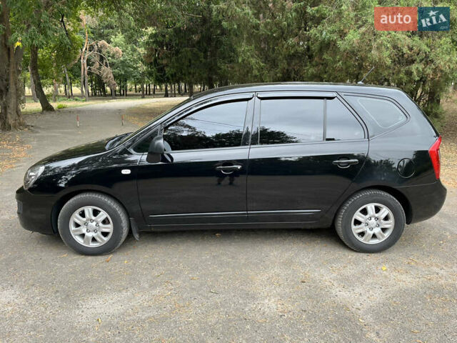 Кіа Каренс 2008 у Харкові на Automoto.ua Чорний Кіа Каренс, об'ємом двигуна 2 л та пробігом 207 тис. км за 7000 $, фото 8 на Automoto.ua
