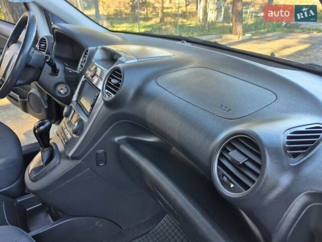 Чорний Кіа Каренс, об'ємом двигуна 2 л та пробігом 88 тис. км за 6450 $, фото 37 на Automoto.ua