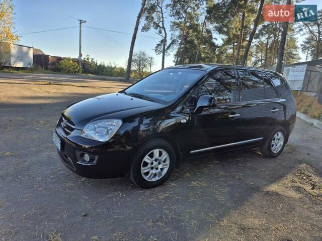 Чорний Кіа Каренс, об'ємом двигуна 2 л та пробігом 88 тис. км за 6450 $, фото 32 на Automoto.ua