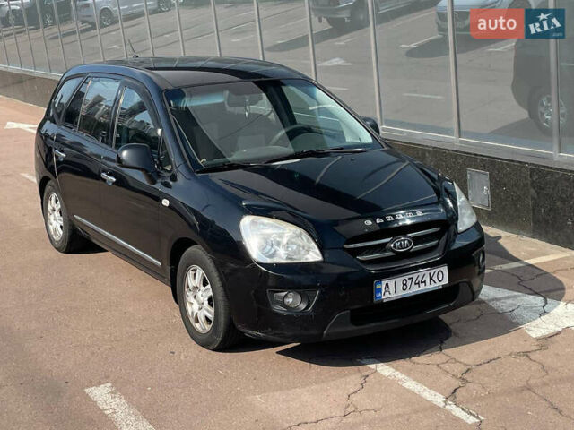 Черный Киа Каренс, объемом двигателя 2 л и пробегом 311 тыс. км за 6700 $, фото 1 на Automoto.ua
