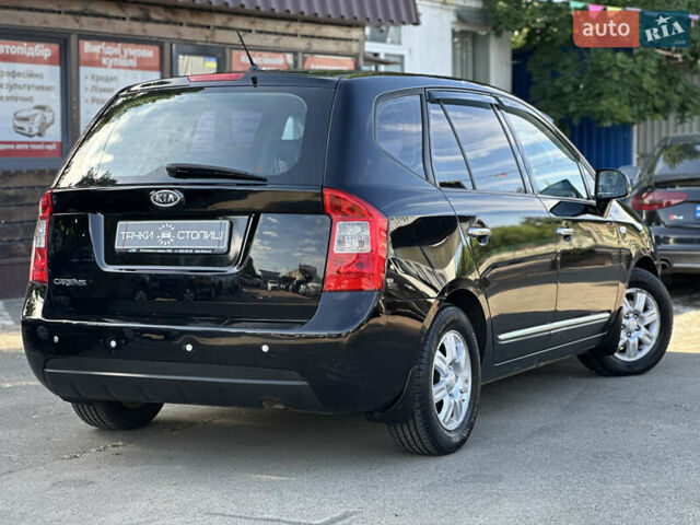 Черный Киа Каренс, объемом двигателя 2 л и пробегом 339 тыс. км за 5900 $, фото 4 на Automoto.ua