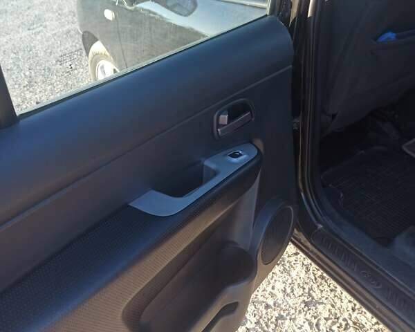 Чорний Кіа Каренс, об'ємом двигуна 2 л та пробігом 234 тис. км за 5500 $, фото 11 на Automoto.ua