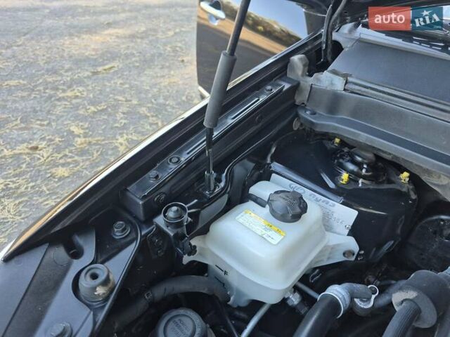 Чорний Кіа Каренс, об'ємом двигуна 2 л та пробігом 88 тис. км за 6450 $, фото 54 на Automoto.ua
