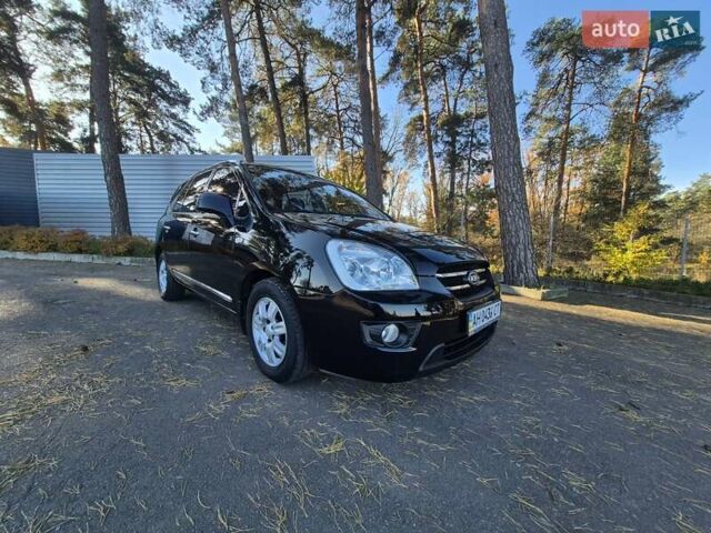 Чорний Кіа Каренс, об'ємом двигуна 2 л та пробігом 88 тис. км за 6450 $, фото 30 на Automoto.ua