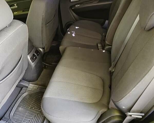Черный Киа Каренс, объемом двигателя 2 л и пробегом 99 тыс. км за 5500 $, фото 4 на Automoto.ua