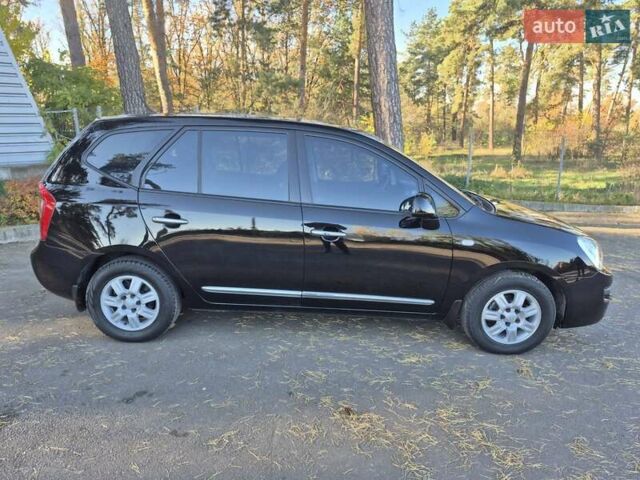 Чорний Кіа Каренс, об'ємом двигуна 2 л та пробігом 88 тис. км за 6450 $, фото 14 на Automoto.ua