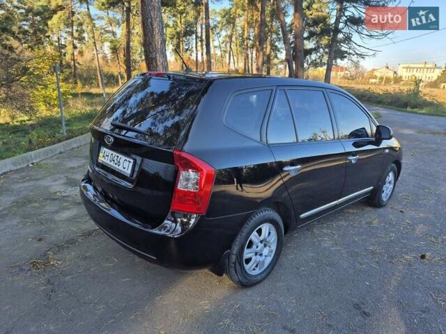 Чорний Кіа Каренс, об'ємом двигуна 2 л та пробігом 88 тис. км за 6450 $, фото 19 на Automoto.ua