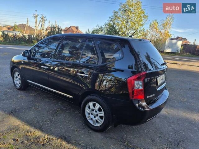 Чорний Кіа Каренс, об'ємом двигуна 2 л та пробігом 88 тис. км за 6450 $, фото 24 на Automoto.ua