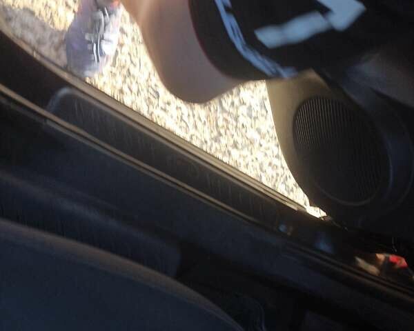 Чорний Кіа Каренс, об'ємом двигуна 2 л та пробігом 234 тис. км за 5500 $, фото 13 на Automoto.ua