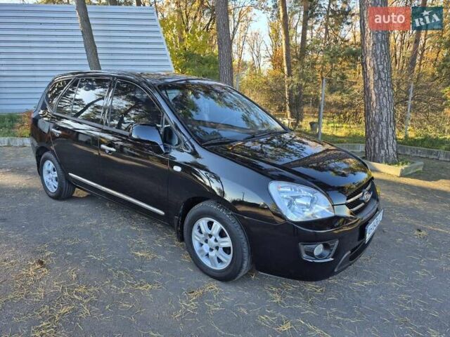 Чорний Кіа Каренс, об'ємом двигуна 2 л та пробігом 88 тис. км за 6450 $, фото 16 на Automoto.ua