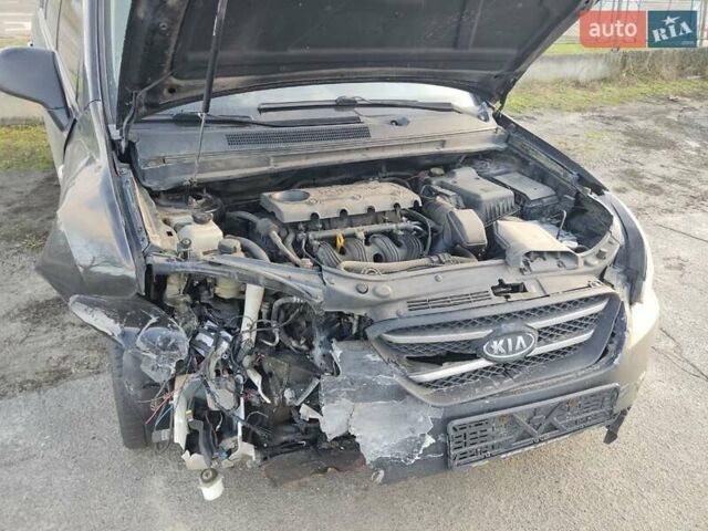 Черный Киа Каренс, объемом двигателя 2 л и пробегом 340 тыс. км за 3000 $, фото 1 на Automoto.ua