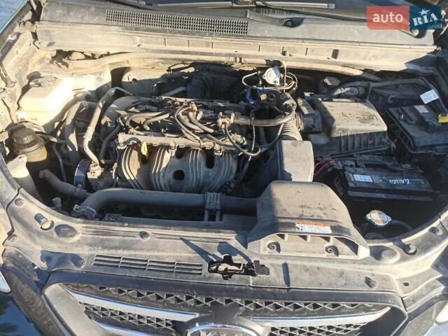 Чорний Кіа Каренс, об'ємом двигуна 2 л та пробігом 234 тис. км за 5500 $, фото 1 на Automoto.ua