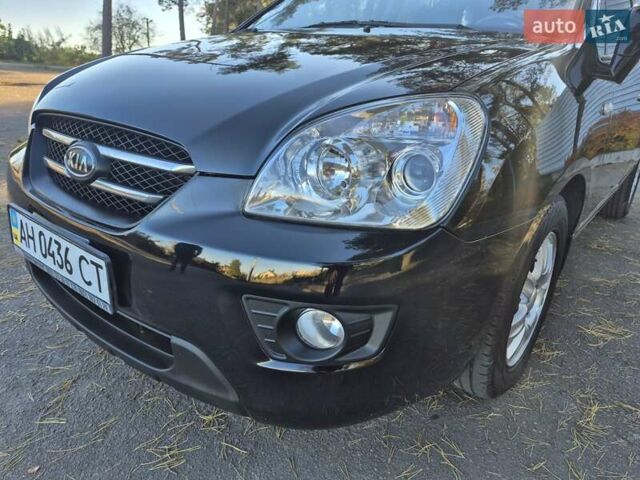 Чорний Кіа Каренс, об'ємом двигуна 2 л та пробігом 88 тис. км за 6450 $, фото 11 на Automoto.ua