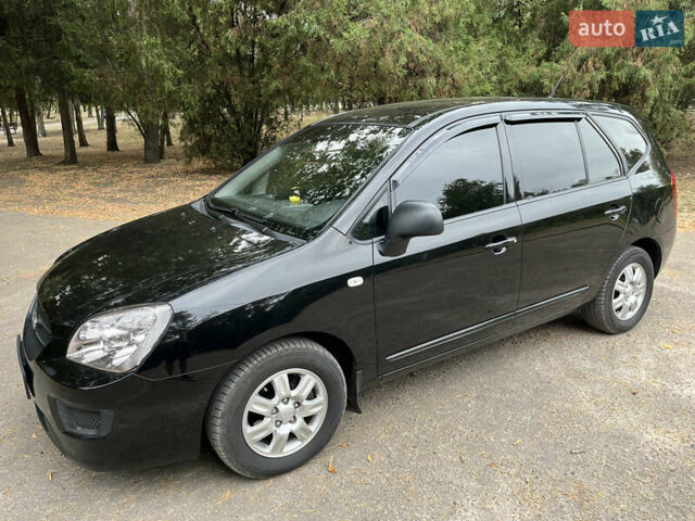 Кіа Каренс 2008 у Харкові на Automoto.ua Чорний Кіа Каренс, об'ємом двигуна 2 л та пробігом 207 тис. км за 7000 $, фото 7 на Automoto.ua