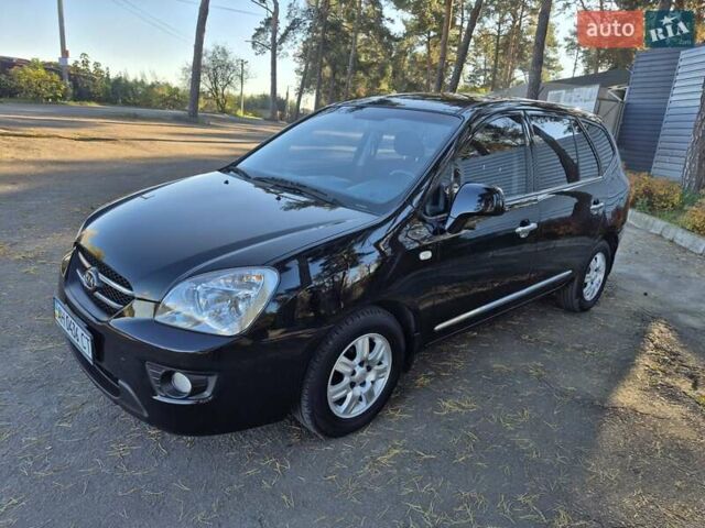 Чорний Кіа Каренс, об'ємом двигуна 2 л та пробігом 88 тис. км за 6450 $, фото 26 на Automoto.ua