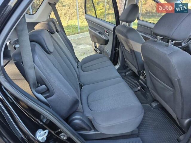 Чорний Кіа Каренс, об'ємом двигуна 2 л та пробігом 88 тис. км за 6450 $, фото 39 на Automoto.ua