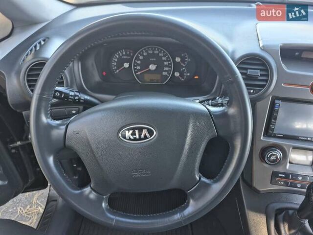 Чорний Кіа Каренс, об'ємом двигуна 2 л та пробігом 88 тис. км за 6450 $, фото 47 на Automoto.ua