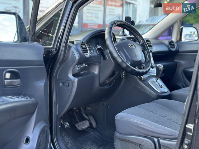 Черный Киа Каренс, объемом двигателя 2 л и пробегом 339 тыс. км за 5900 $, фото 9 на Automoto.ua