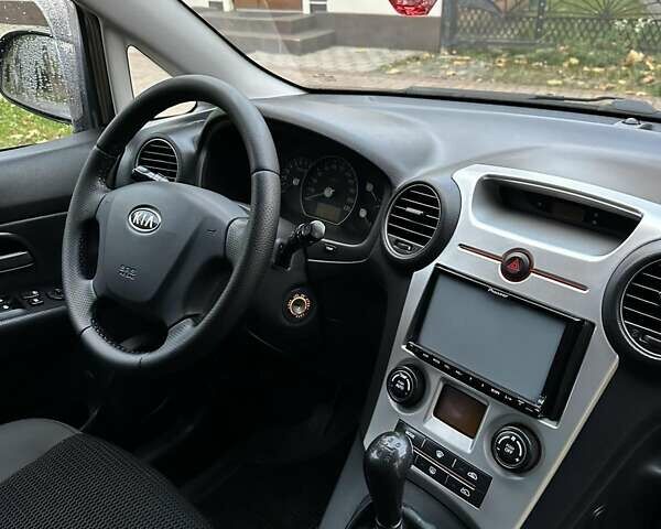 Киа Каренс 2008 в Хусте на Automoto.ua Черный Киа Каренс, объемом двигателя 2 л и пробегом 125 тыс. км за 6700 $, фото 6 на Automoto.ua
