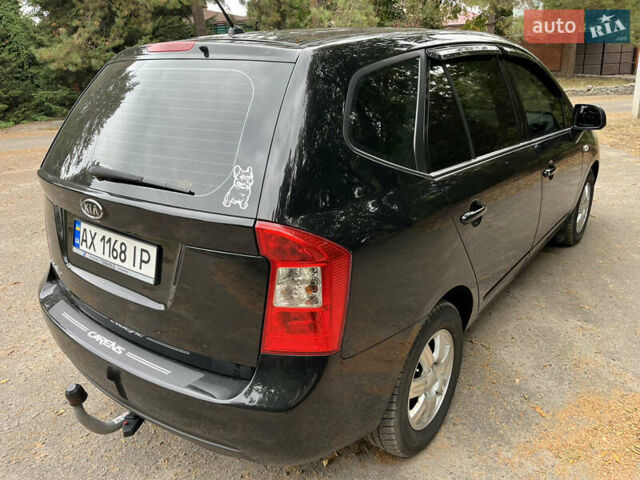 Кіа Каренс 2008 у Харкові на Automoto.ua Чорний Кіа Каренс, об'ємом двигуна 2 л та пробігом 207 тис. км за 7000 $, фото 4 на Automoto.ua