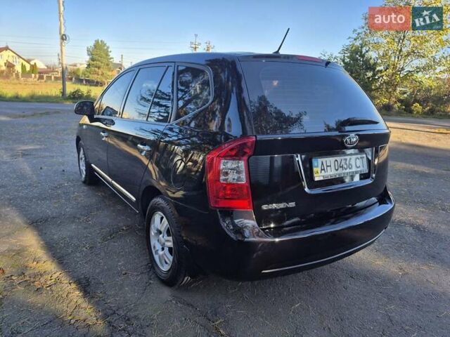 Чорний Кіа Каренс, об'ємом двигуна 2 л та пробігом 88 тис. км за 6450 $, фото 23 на Automoto.ua