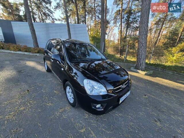 Чорний Кіа Каренс, об'ємом двигуна 2 л та пробігом 88 тис. км за 6450 $, фото 29 на Automoto.ua