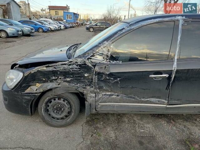 Черный Киа Каренс, объемом двигателя 2 л и пробегом 340 тыс. км за 3000 $, фото 10 на Automoto.ua