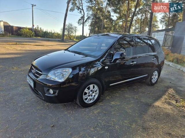 Чорний Кіа Каренс, об'ємом двигуна 2 л та пробігом 88 тис. км за 6450 $, фото 25 на Automoto.ua