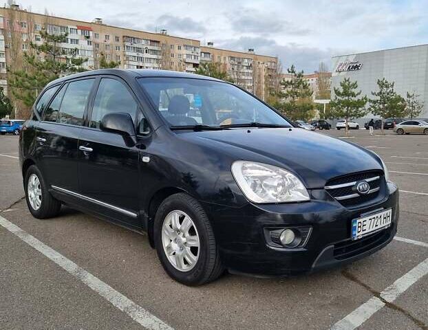 Черный Киа Каренс, объемом двигателя 2 л и пробегом 347 тыс. км за 5500 $, фото 1 на Automoto.ua