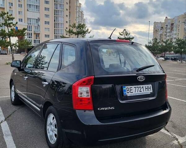 Черный Киа Каренс, объемом двигателя 2 л и пробегом 347 тыс. км за 5500 $, фото 2 на Automoto.ua