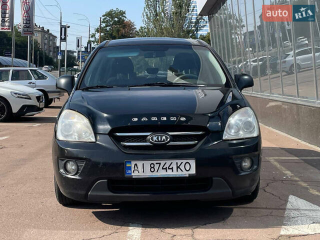 Черный Киа Каренс, объемом двигателя 2 л и пробегом 311 тыс. км за 6700 $, фото 3 на Automoto.ua