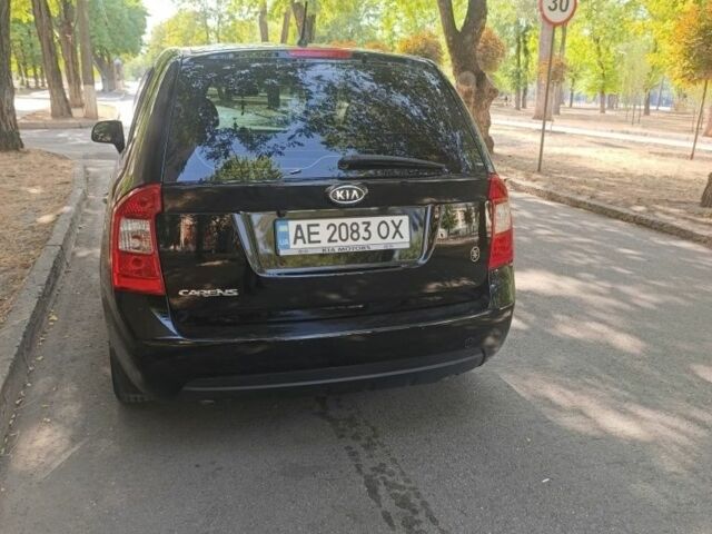 Киа Каренс 2008 в Кривом Роге на Automoto.ua Черный Киа Каренс, объемом двигателя 2 л и пробегом 335 тыс. км за 6300 $, фото 2 на Automoto.ua
