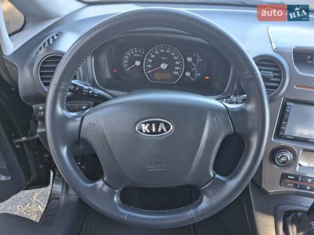Чорний Кіа Каренс, об'ємом двигуна 2 л та пробігом 88 тис. км за 6450 $, фото 46 на Automoto.ua