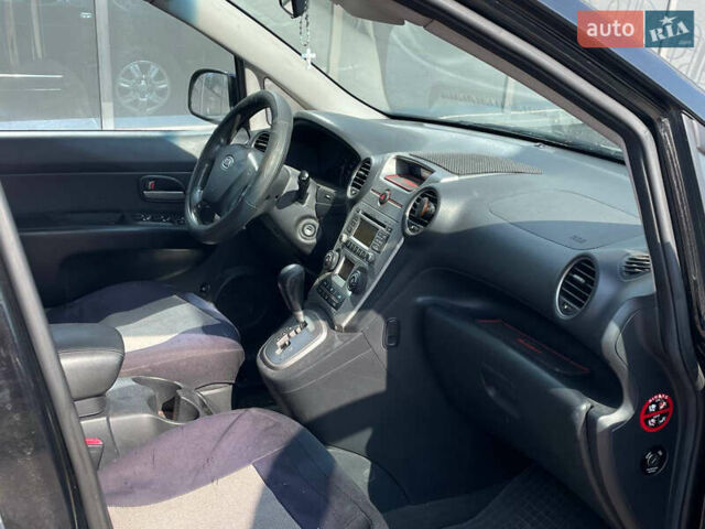 Черный Киа Каренс, объемом двигателя 2 л и пробегом 311 тыс. км за 6700 $, фото 8 на Automoto.ua