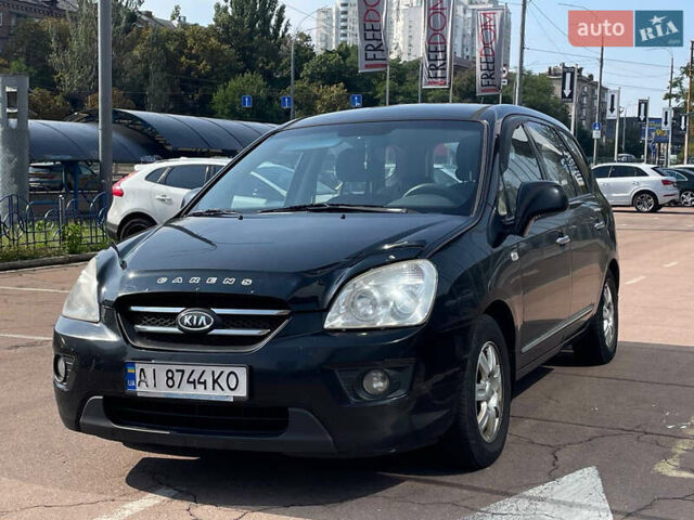 Черный Киа Каренс, объемом двигателя 2 л и пробегом 311 тыс. км за 6700 $, фото 2 на Automoto.ua