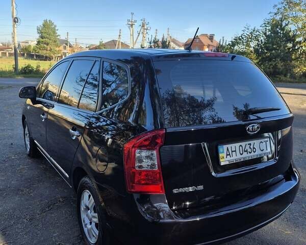 Чорний Кіа Каренс, об'ємом двигуна 2 л та пробігом 88 тис. км за 6450 $, фото 21 на Automoto.ua